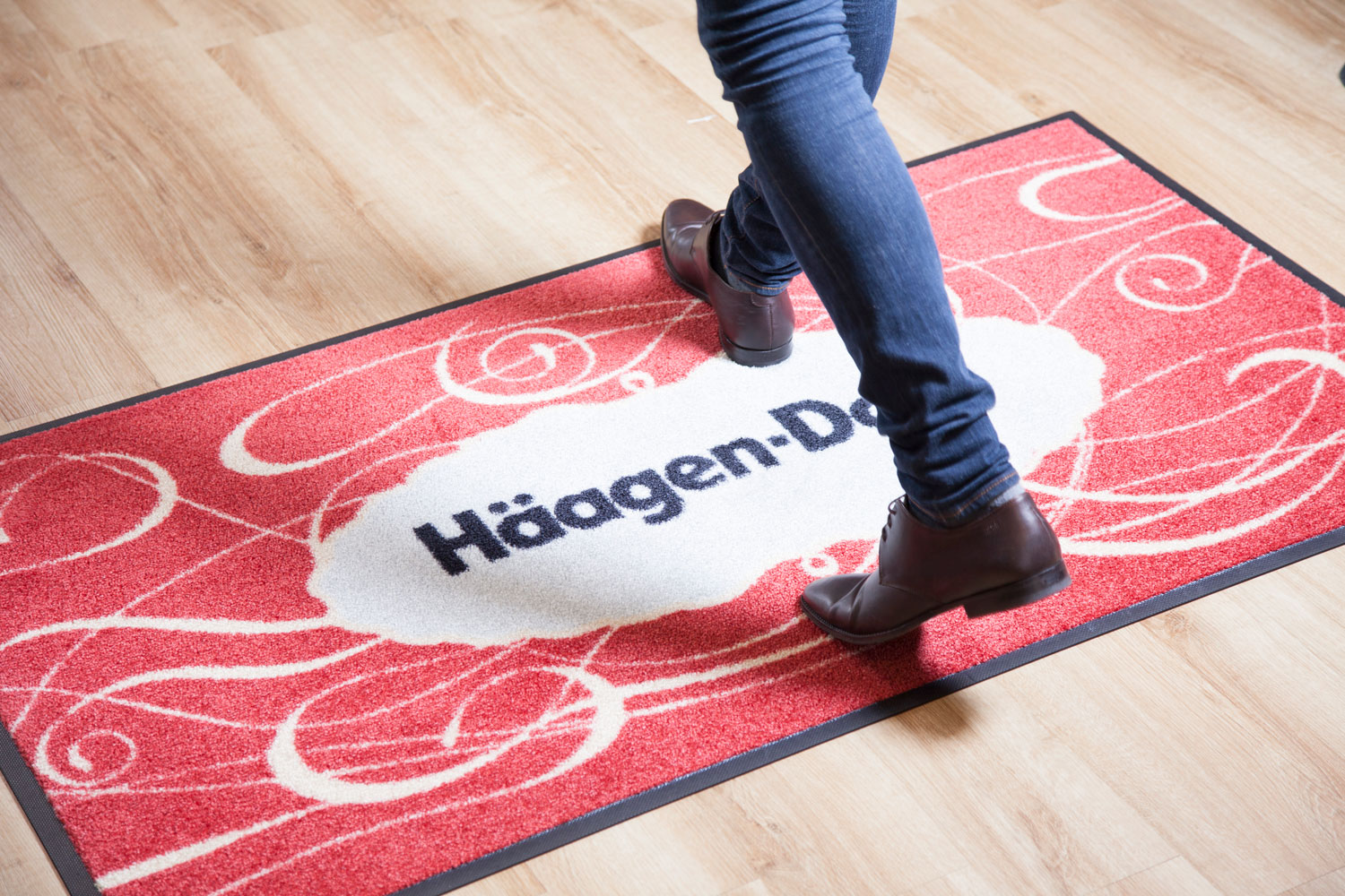 Walking on heavy-duty logo mats - Haagen Daz